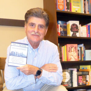 Guy at Barnes and Noble posing with the 6R Method book